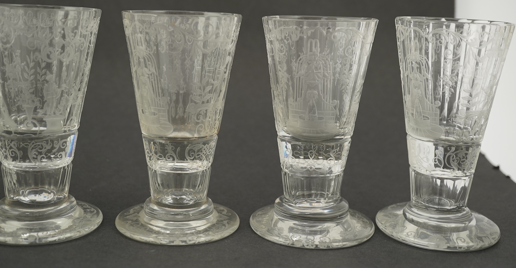 A set of six Lobmeyr engraved beakers, c.1880